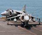 A pair of BAe Sea Harriers ready for take-off; color